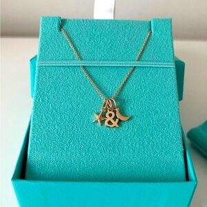Tiffany & Co love star and moon pendant necklace 18k rose gold